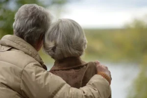 depositphotos 326711766 stock photo happy senior couple sitting park